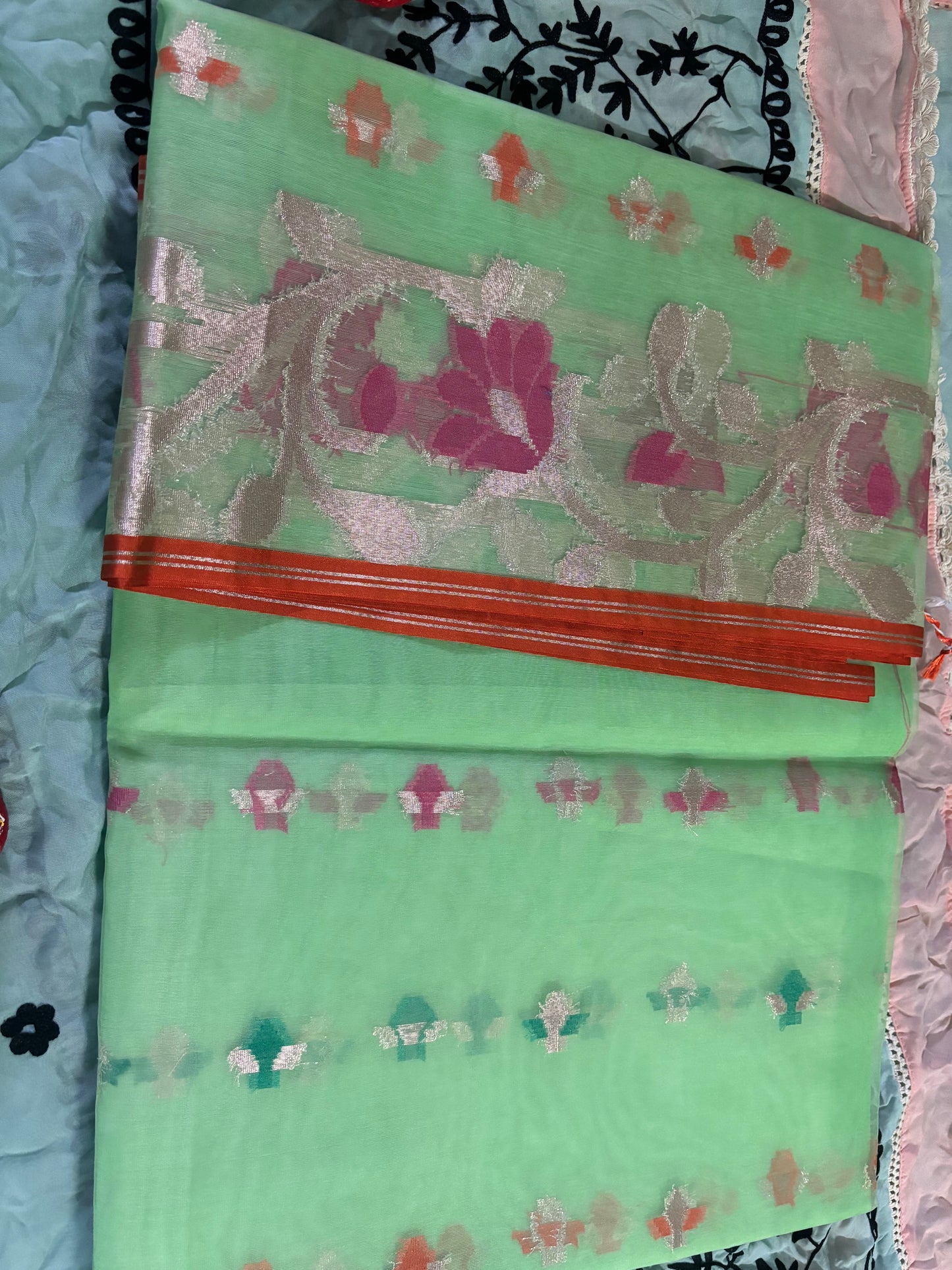 COLOURFULZARI BOTIES WHOL OVER IN GREEN ORGANZA SAREE