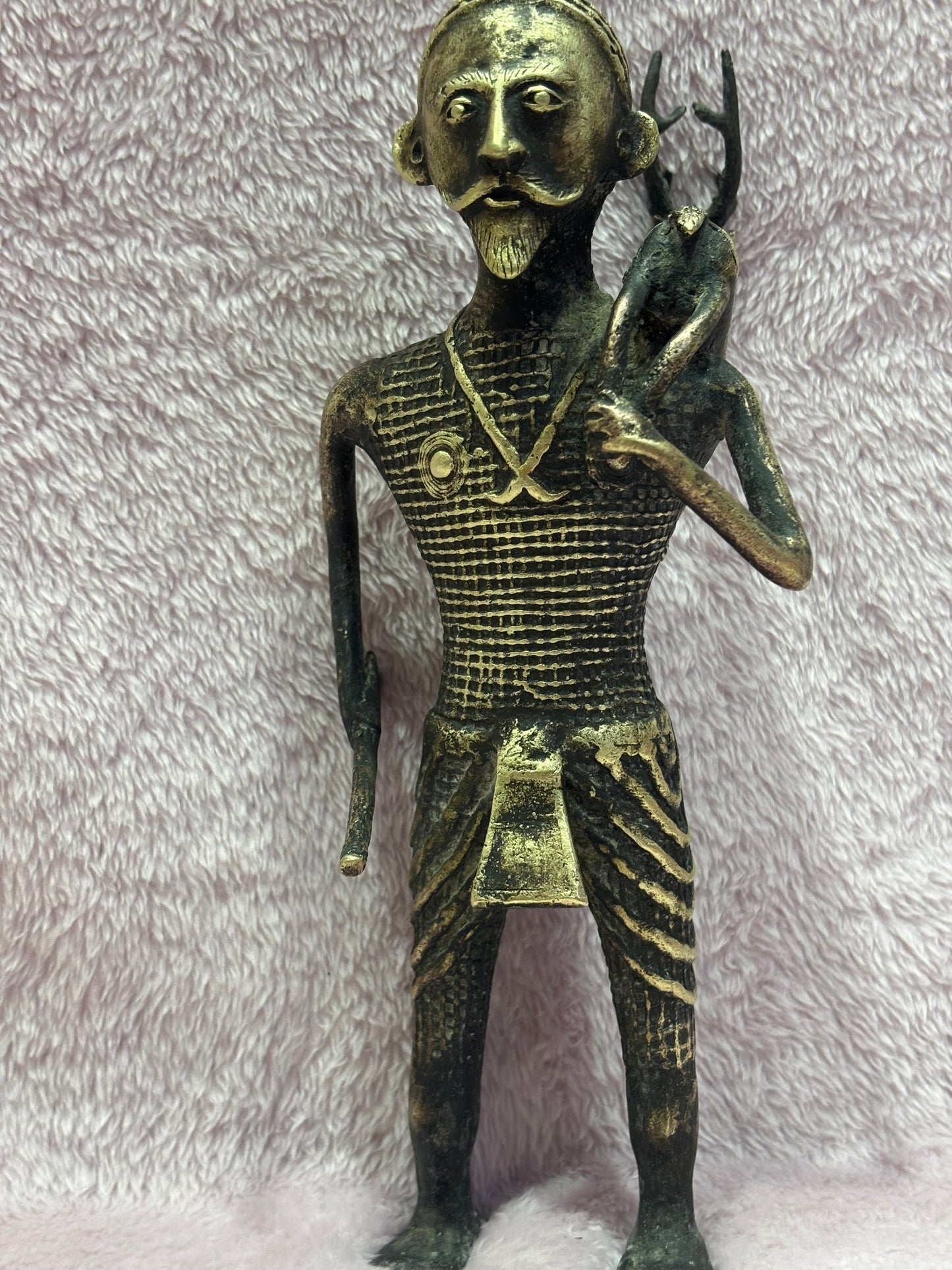 Z .ANTIQUE FORM STATUE OF A MAN WITH SWAMP DEER