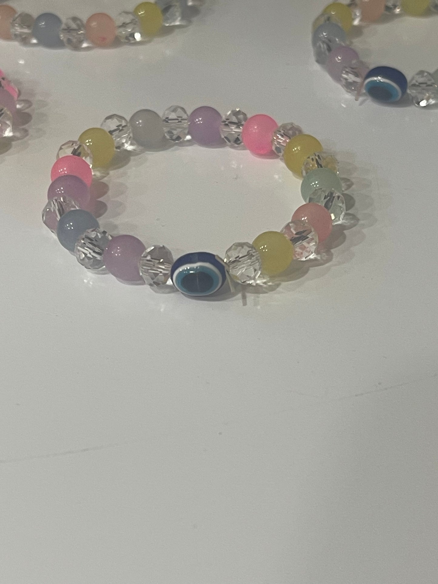 BEAUTIFUL BEADS BRACELET IN MULTI PASTEL COLOUR WITH EVIL EYE BEAD.