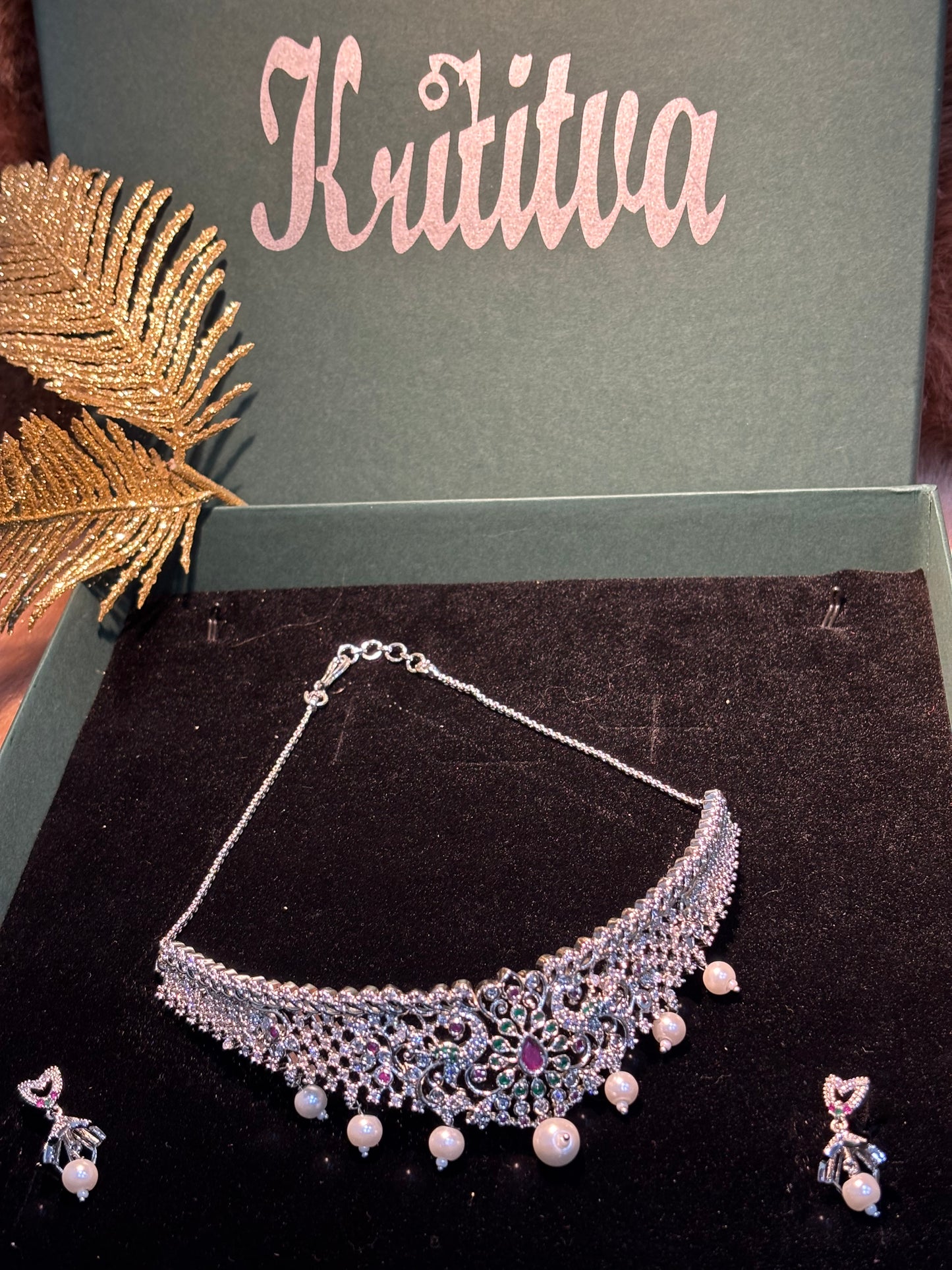 RADIANT AD CHOKER SET IN SIVER COLOUR WITH MULTICOLOR DESIGN .