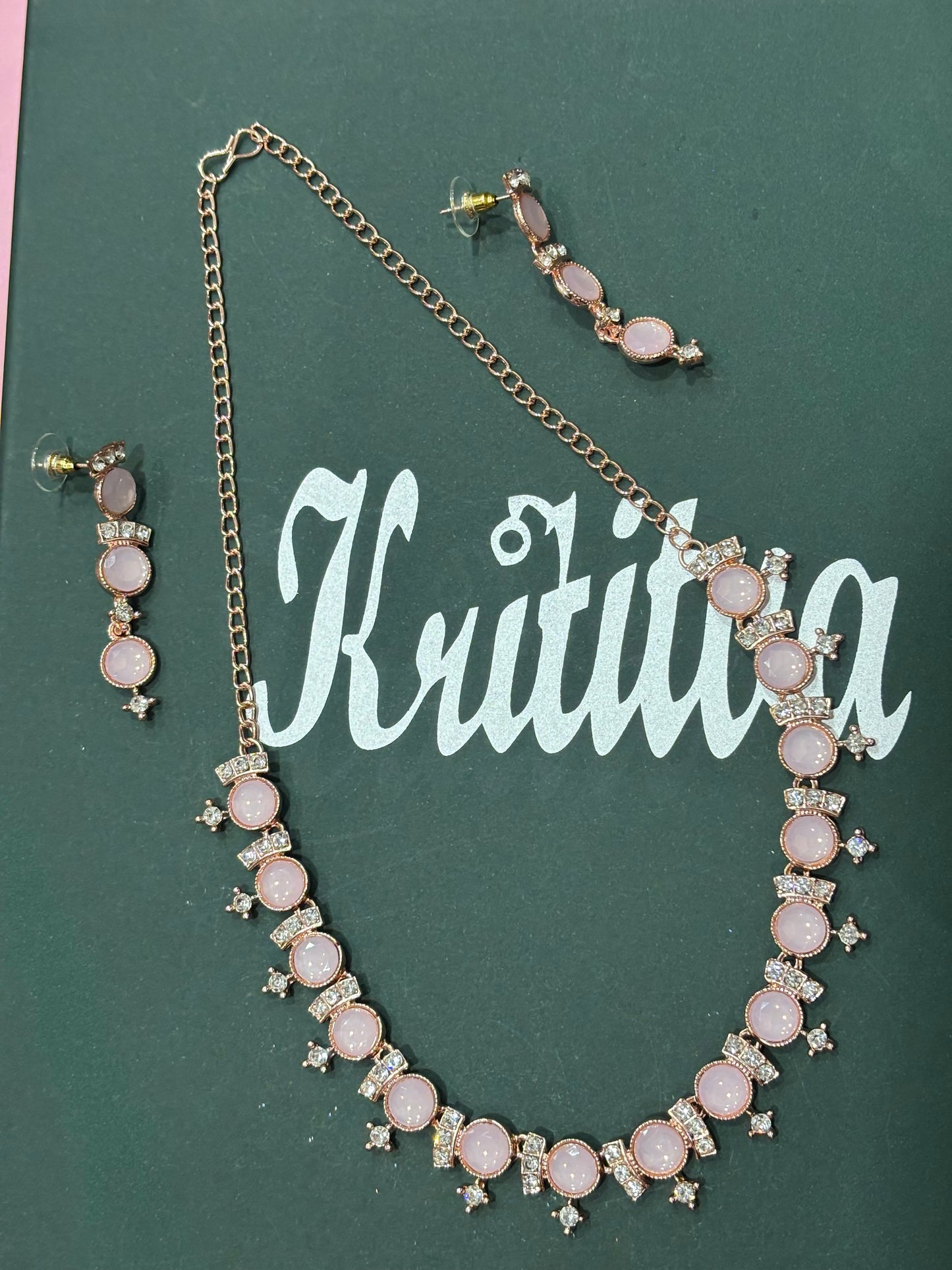 CHARMING ROSEGOLD NECKLACE SET WITH FLAMINGO PINK STONE WORK