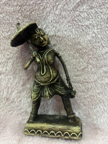 Z .ANTIQUE FORM STATUE OF A HAPPY TRIBAL WOMEN WITH UMBRELLA