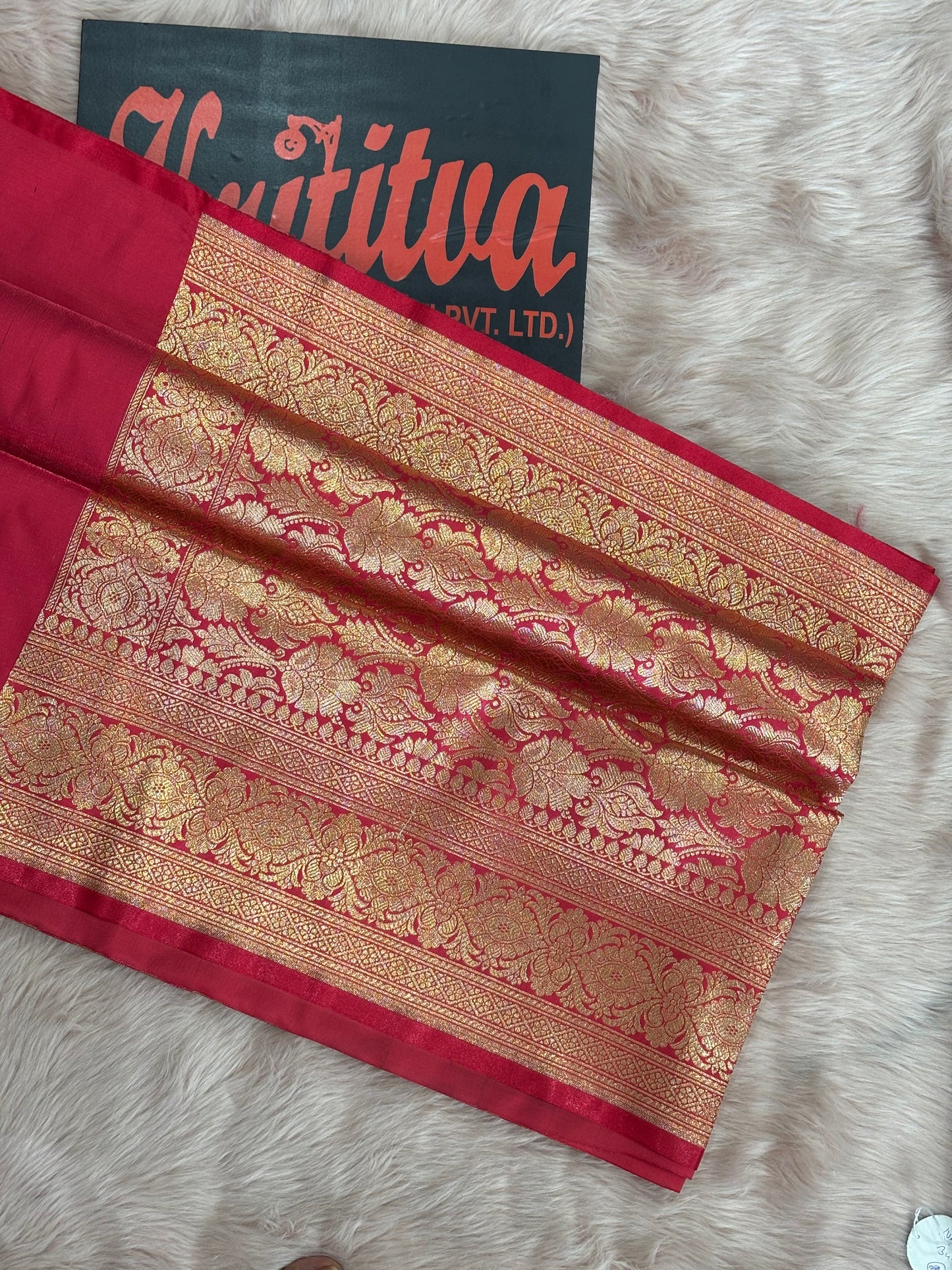BIG BOOTIES GOLDEN ZARI BANARSI WORK ON RED BACKGROUND .