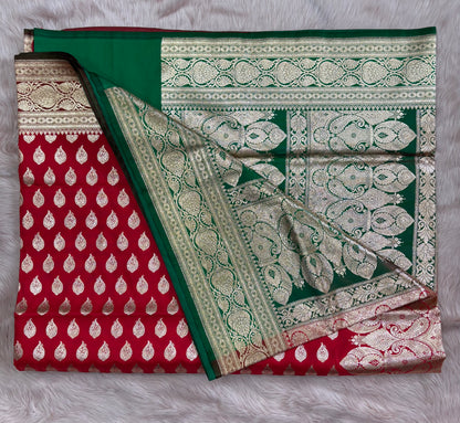 RADIANT BANARASI SAREE IN RED COLOUR WITH SMALL BOOTIES AND HEAVY BORDER WITHCONTRAST GREEN PALLU