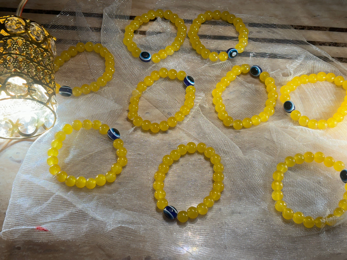 X-EVIL EYE PROTECTION YELLOW BEADS BRACELATE