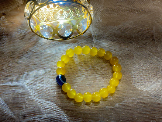 X-EVIL EYE PROTECTION YELLOW BEADS BRACELATE