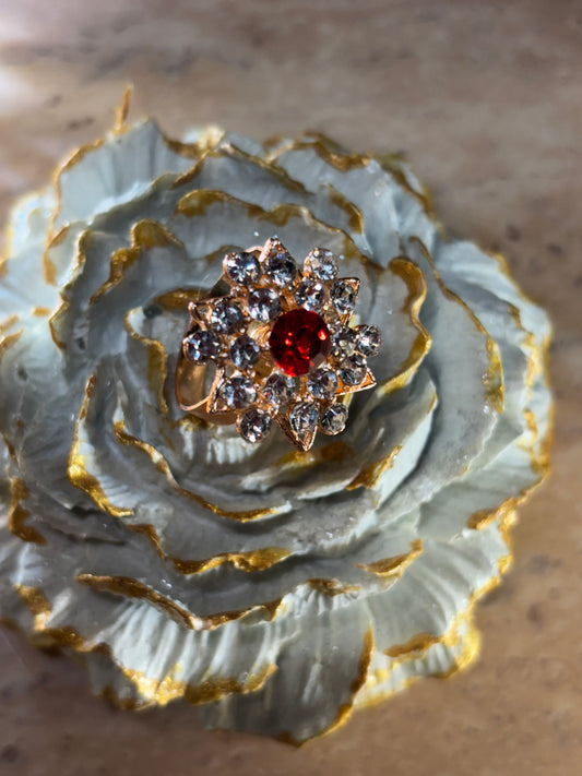 STONE RING IN RED COLOUR .