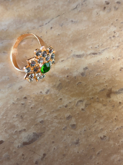 STONE RING IN GREEN SHADE .