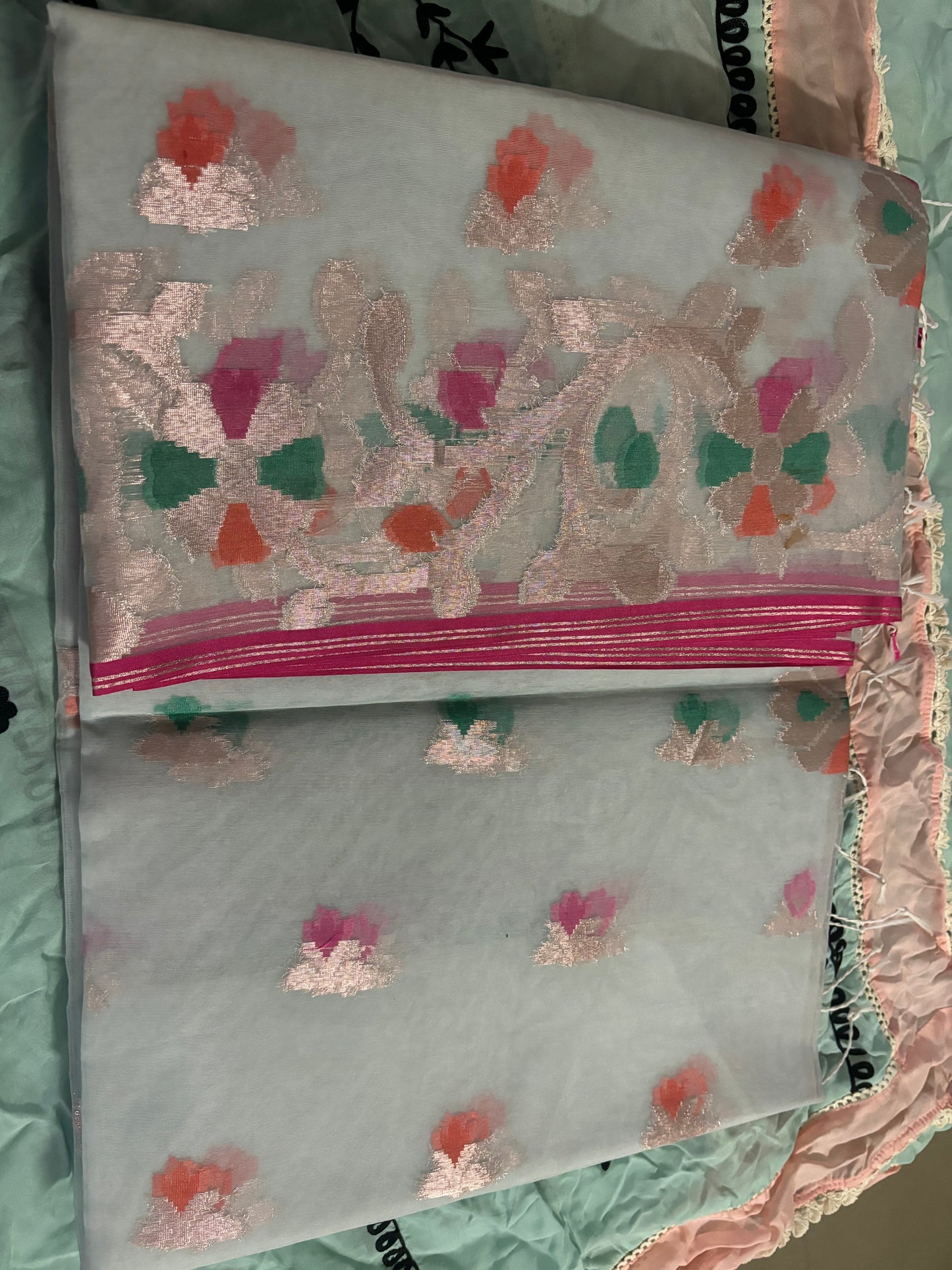 A:COLOURFUL ZARI BOOTIES WORK ON WHOLE ORGANZA  SAREE