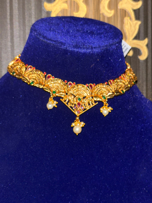 traditional haar design with red beads