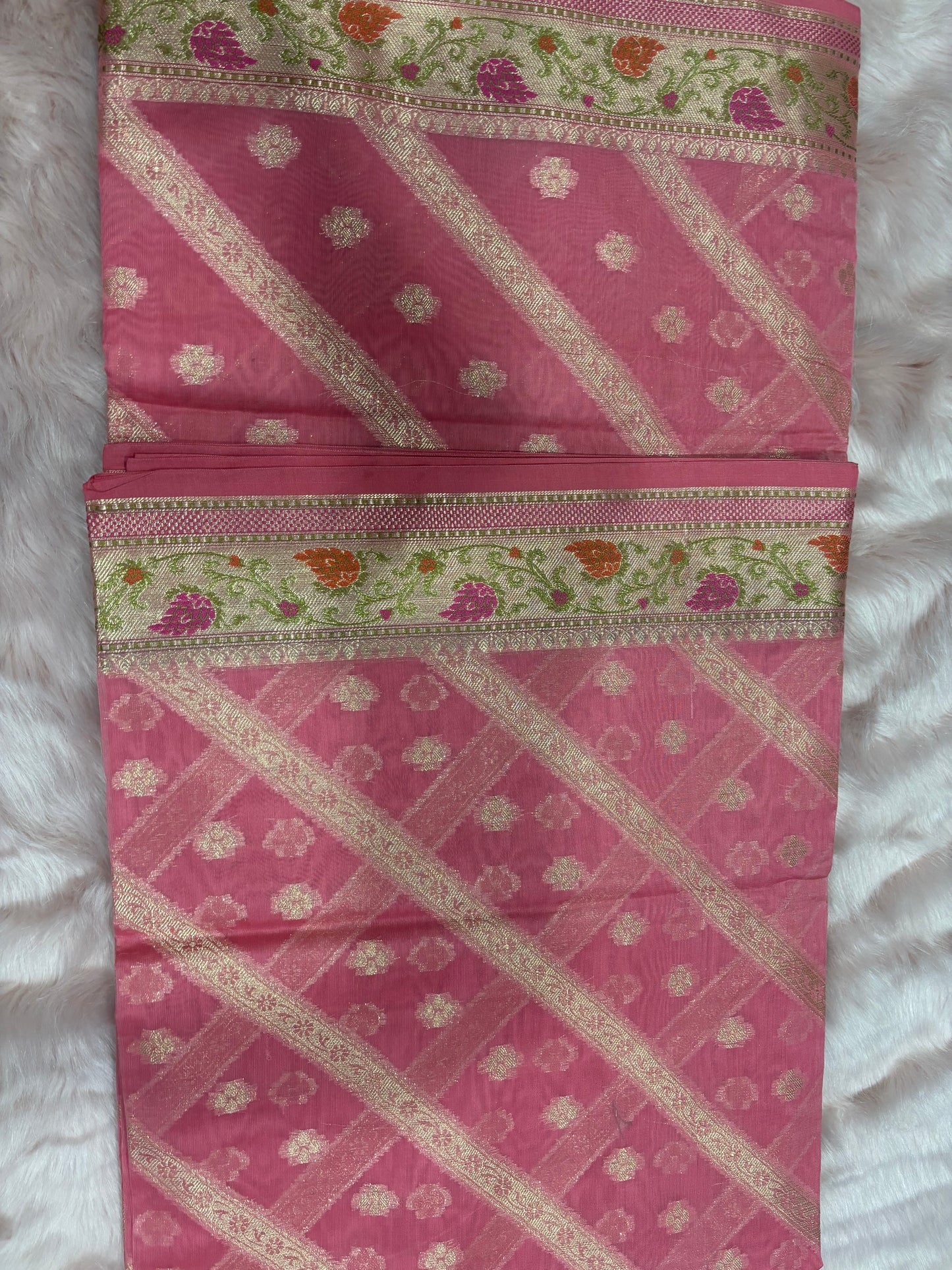 PINK BACKGROUND WITH STRIPE PATTERN AND BOOTIES IN WHOLE SAREE