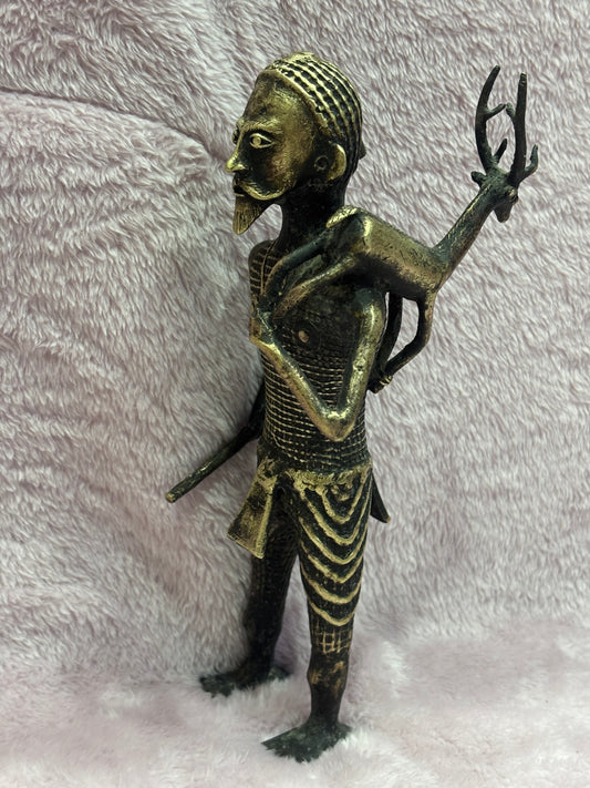 Z .ANTIQUE FORM STATUE OF A MAN WITH SWAMP DEER