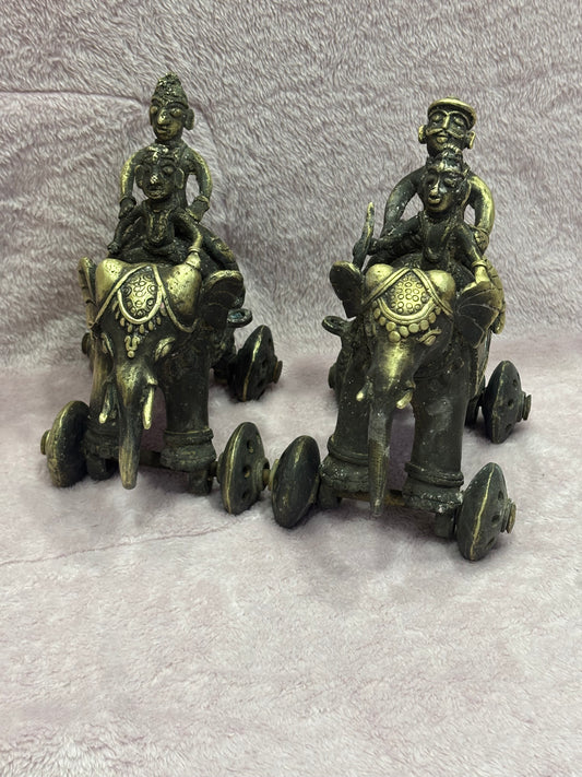 Z .ANTIQUE FORM STATUE OF 2 MEN SITTING ON ELEPHANT