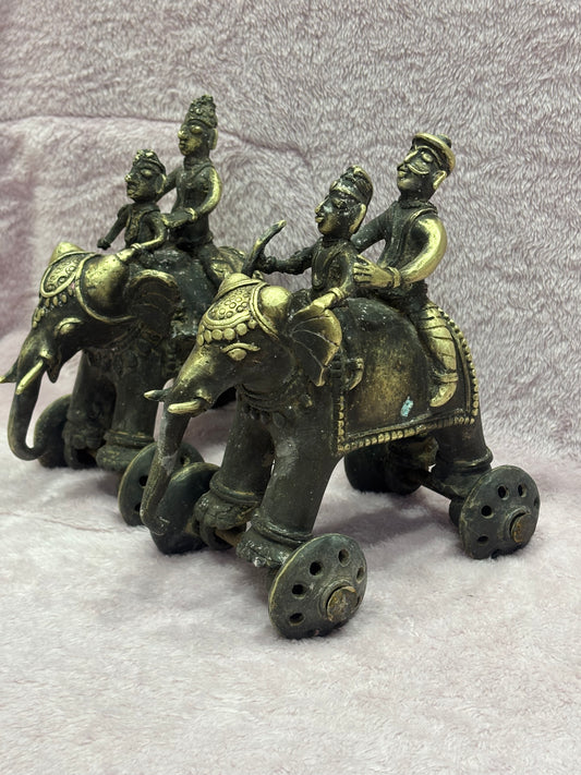 Z .ANTIQUE FORM STATUE OF 2 MEN SITTING ON ELEPHANT
