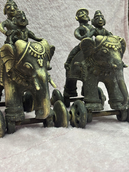 Z .ANTIQUE FORM STATUE OF 2 MEN SITTING ON ELEPHANT