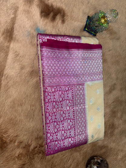 A: BEIGE AND FUCHSIA PINK HEAVY BANARASI GEORGETTE SAREE