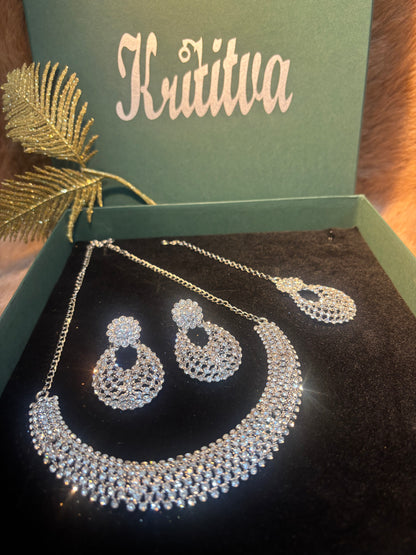 MAGNIFICENT SIVLER STONE NECKLACE IN SLEEK CHOKAR PATTERN WITH EARRING AND TIKA