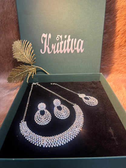 MAGNIFICENT SIVLER STONE NECKLACE IN SLEEK CHOKAR PATTERN WITH EARRING AND TIKA