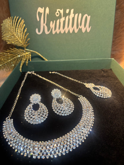 MAGNIFICENT SIVLER STONE NECKLACE IN SLEEK CHOKAR PATTERN WITH EARRING AND TIKA