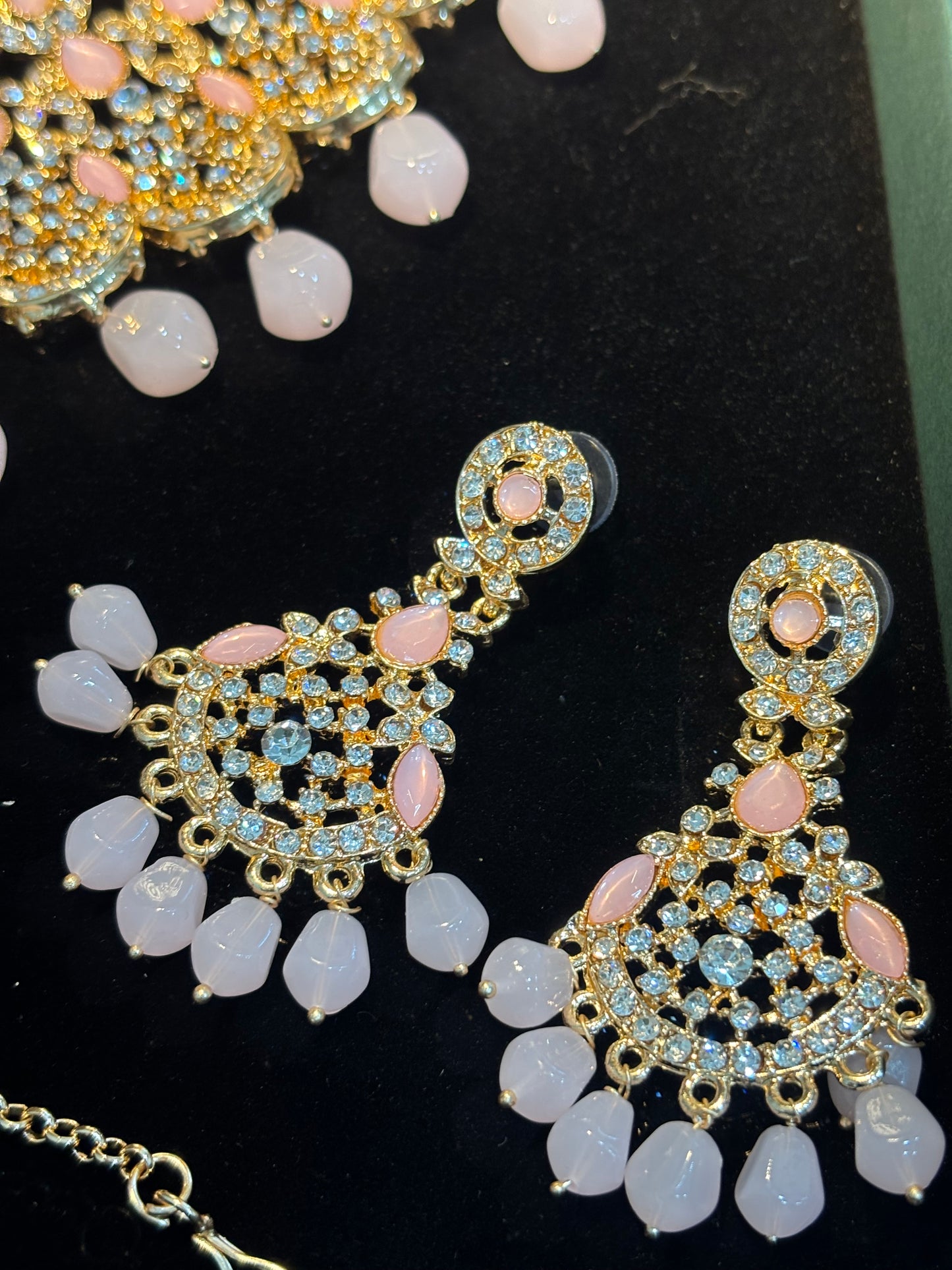 ENCHANTING GOLDEN AND  PINK STONE BEAUTIFULLY CRAFTED CHOKAR SET