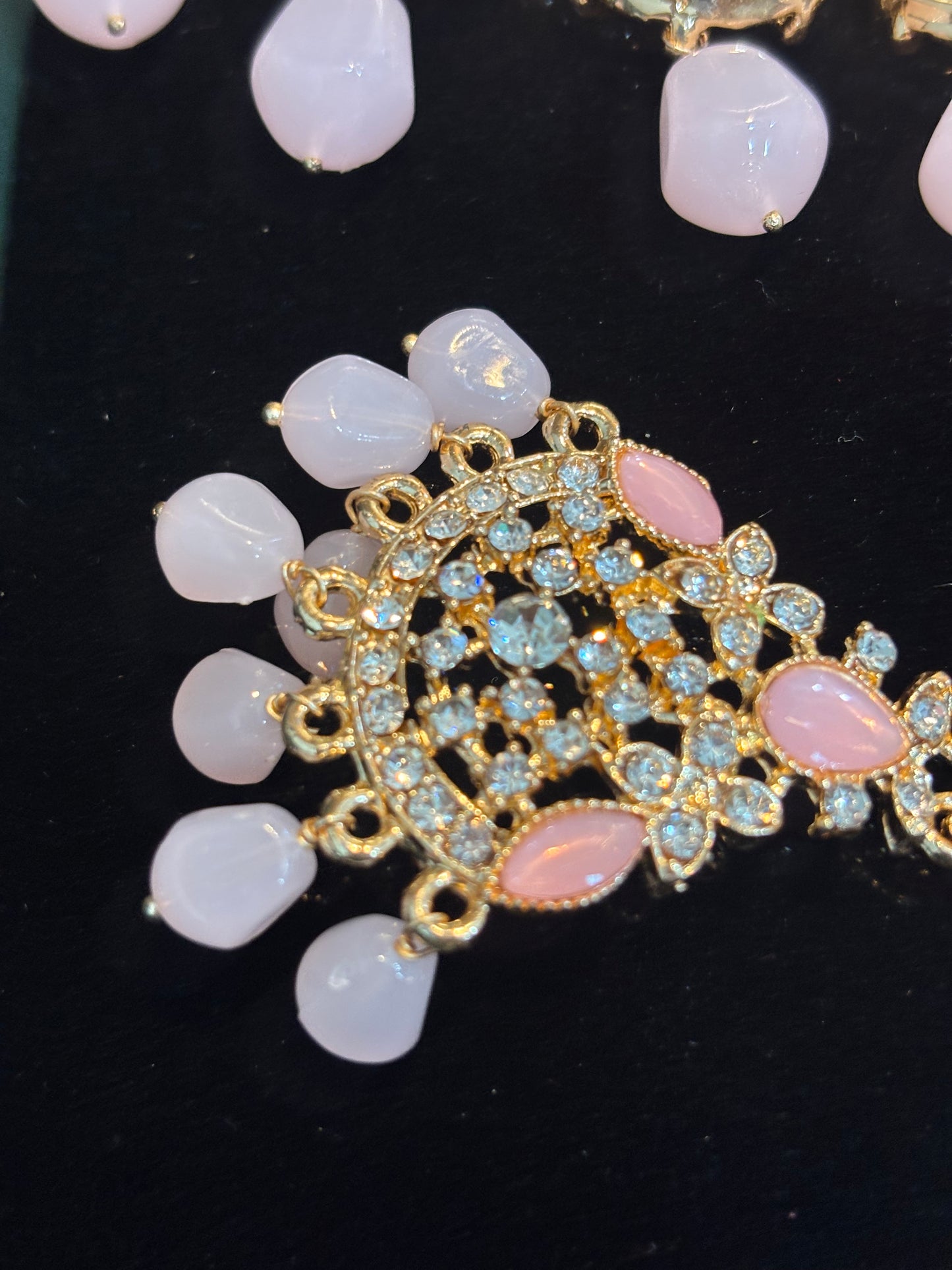 ENCHANTING GOLDEN AND  PINK STONE BEAUTIFULLY CRAFTED CHOKAR SET