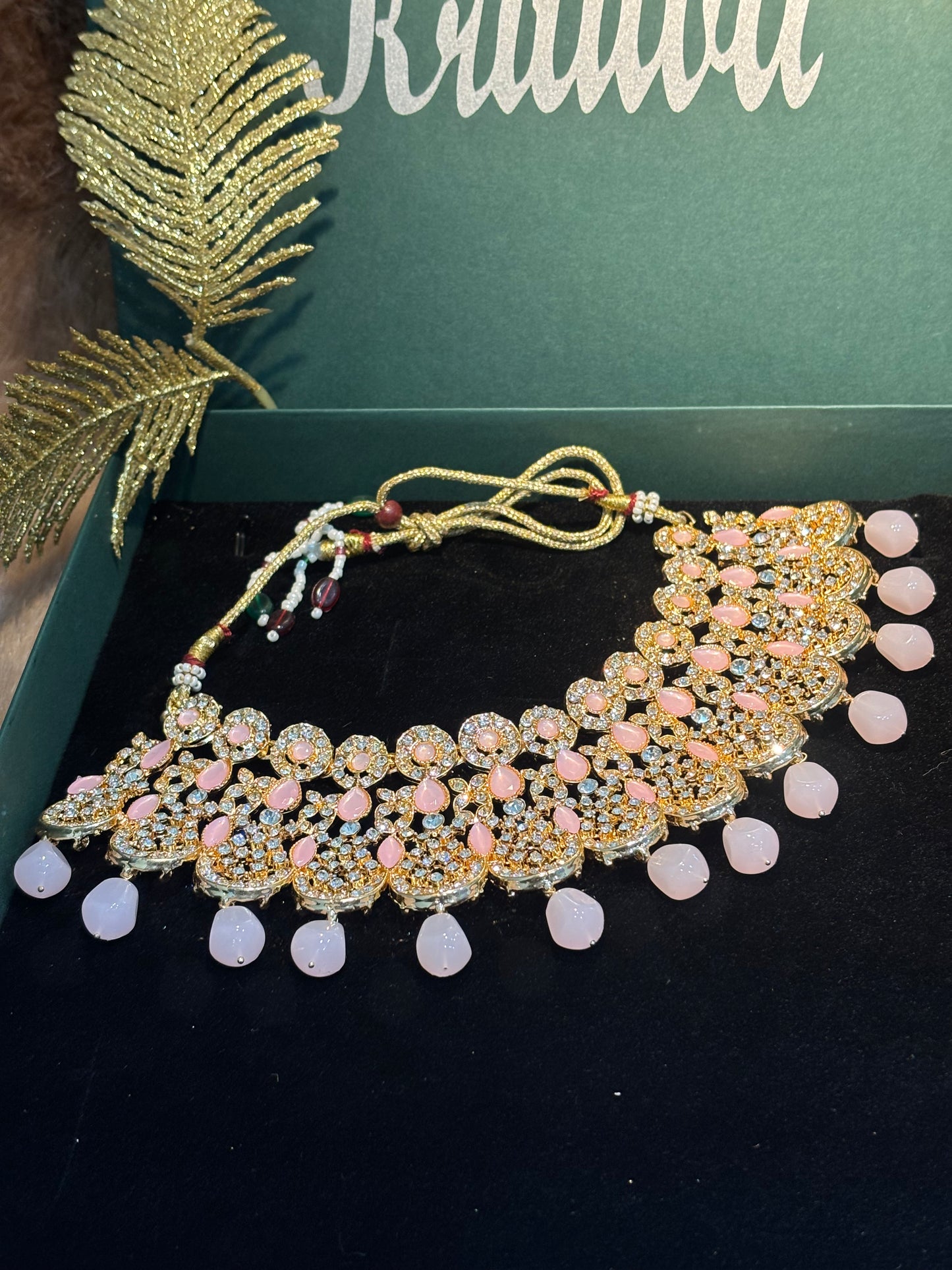 ENCHANTING GOLDEN AND  PINK STONE BEAUTIFULLY CRAFTED CHOKAR SET