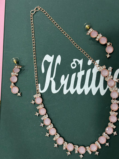 CHARMING ROSEGOLD NECKLACE SET WITH FLAMINGO PINK STONE WORK