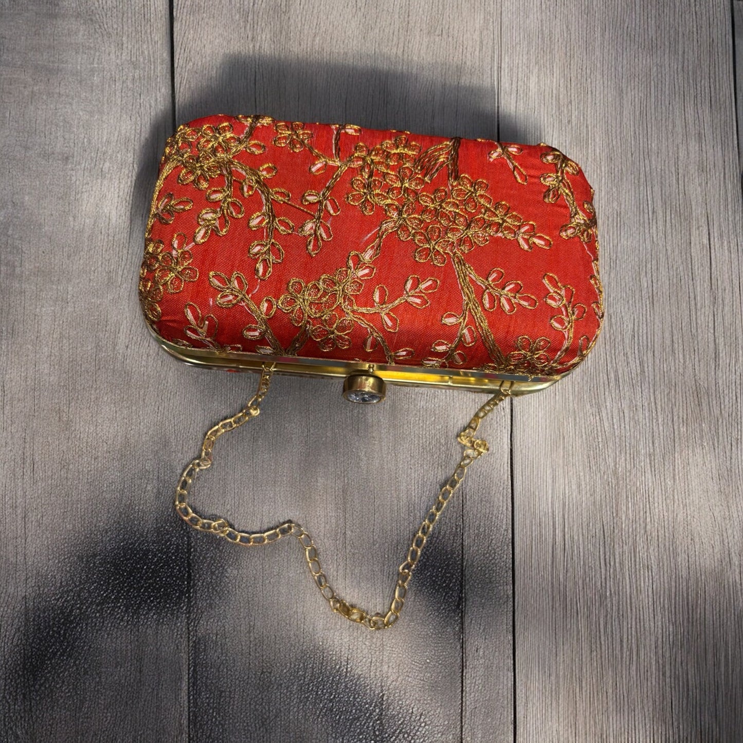 EMBROIDERED WITH ZARI BEL WORK WEDDING CLUTCH  IN ORANGE COLOUR